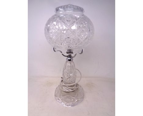 A cut glass lead crystal table lamp with shade (height 46cm).