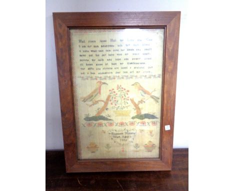A pine framed print of a Georgian sampler