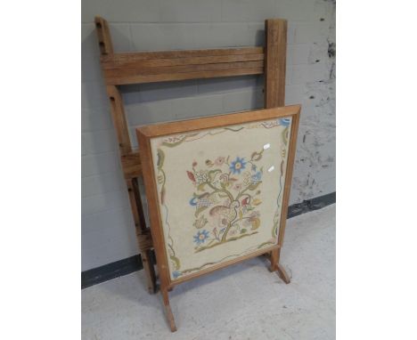 An Edwardian tapestry firescreen/occasional table together with a rustic folding clothes airer.