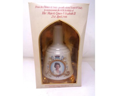 A Bell's scotch whisky decanter commemorating the 60th birthday of Queen Elizabeth II (1986). (boxed)