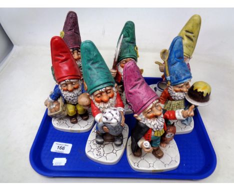 A tray of Goebel garden gnome figures.