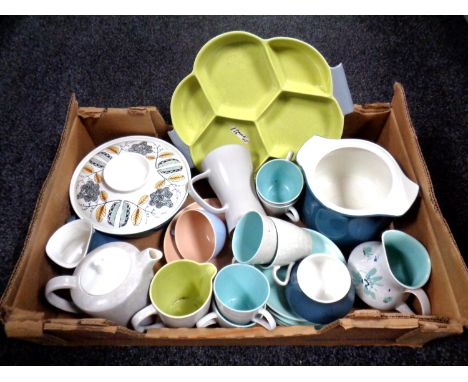 A box of miscellaneous Poole pottery dinner wares.