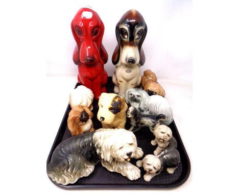 A tray of two Dutch Jerna pottery dog ornaments and further ceramic dog figures.