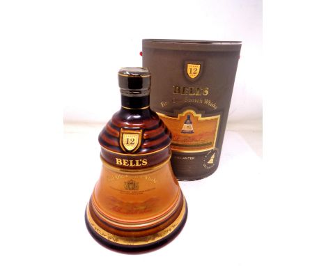 A Wade Bell's fine old scotch whisky decanter, aged 12 years, sealed with contents. (boxed)