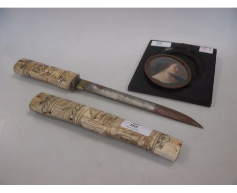 A Japanese dagger in carved bone scabbard together with a miniature in faux tortoiseshell frame (2)  