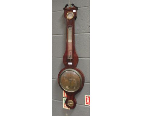 B Briola, Cambridge, a George III mahogany wheel barometer  