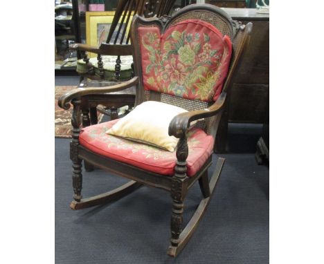 A French mahogany framed bergere rocking chair with tapestry needlework cushions, 62cm wide, and a window seat, 67cm wide  