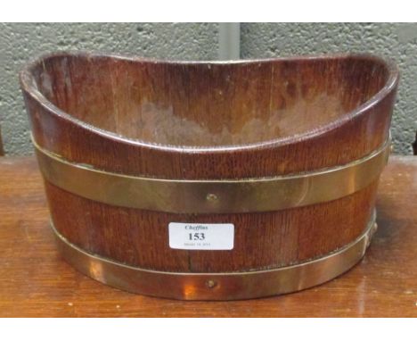 A copper coopered oak planter  
