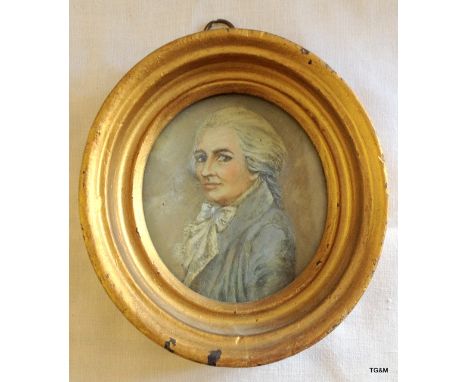 Portrait miniature painted on ivory of a gentleman in an oval frame 12.5cm high