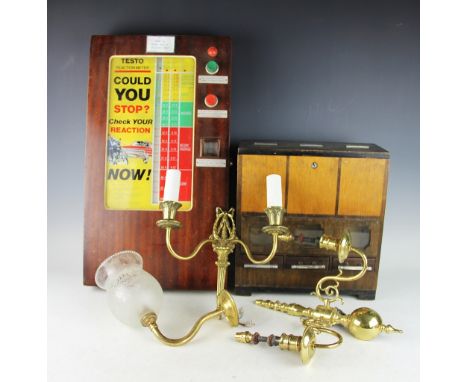 A Vintage Testo reaction meter, the wooden case enclosing a glass display screen, along with a cigarette dispenser, two vinta
