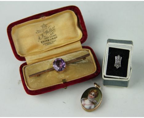 An amethyst set bar brooch, within yellow metal mount stamped '9ct', a three stone diamond illusion set ring and a portrait o