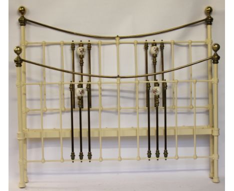 A late Victorian cast iron and brass double bed, with floral printed ceramic ball detailing, 134cm H x 154cm W (with side rai