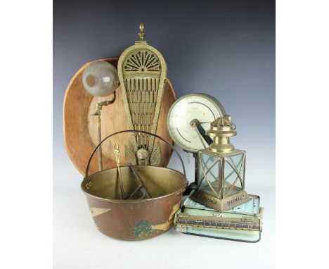 A large carved elm bowl, 48cm wide, an Oertling Ltd deniers scale, a brass lantern, a light fitting, a fan brass spark guard 