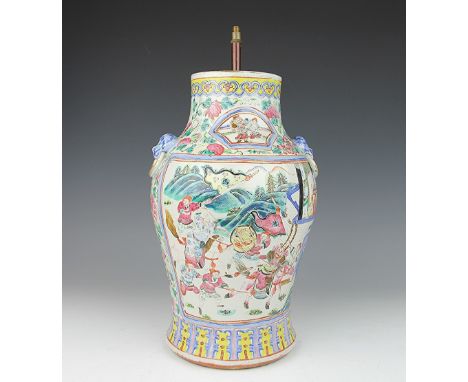 A late 19th century famille rose porcelain lamp, painted with two panels, elder in a pavilion and hunting scene, 36cm