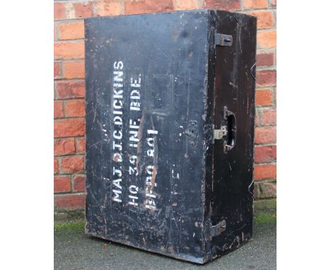 A tin army trunk with white lettering 'MAJ. D. J.C Dickins, HO 39 INF. BDE BFR0801', 35cm x 88cm x 60cm with a home guard hel