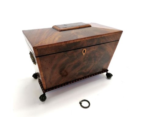 Antique flame mahogany veneered tea caddy box on ball / claw feet with egg and dart mounding around base and original glass m