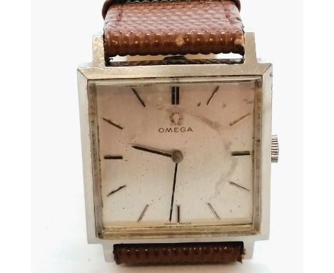 Omega manual wind gents wristwatch in a square stainless steel case (25mm) - running ~ has marks to dial- We cannot guarantee