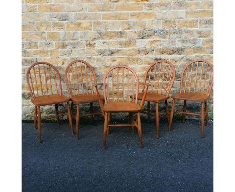 Five Ercol dining chairs including one carver 