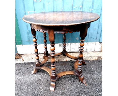 Oak stretcher based circular side table with a carved skirt and 6 bobbin turned legs - 75cm diameter &amp; 72cm high ~ In goo