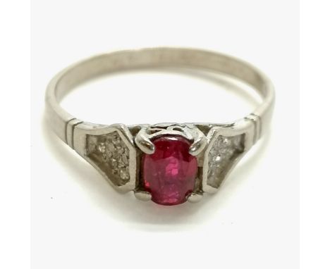 14ct marked white gold ruby ring with diamond set shoulders - size P½ &amp; 2.5g total weight ~ wear to centre stone 