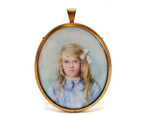 Portrait miniature of a girl in a gilt metal oval frame - 8.5cm drop 