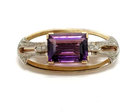 14ct hallmarked gold Art Deco brooch set with large amethyst &amp; 4 diamonds - 5cm across &amp; 17.6g total weight 
