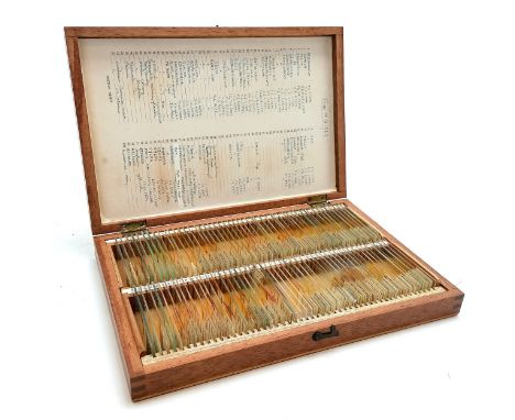 Cased lot of 100 microscope slides (ex John M A Sly) of mostly plant specimens although does include Tineid moth genitalia (!