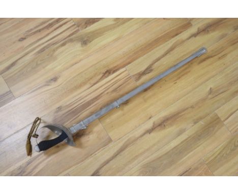 An officer's sword, shagreen grip and 88cm etched, single-edged blade, in scabbard