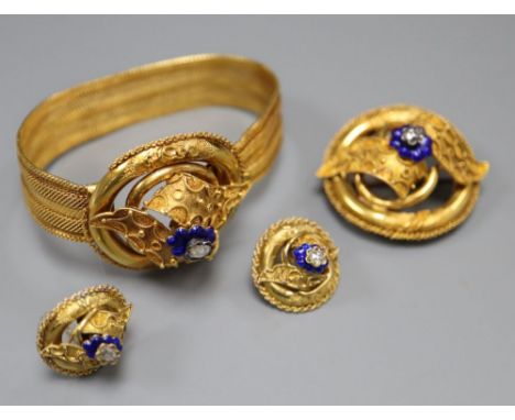 A Victorian yellow metal, blue enamel and rose cut diamond set demi parure, comprising a bracelet, pendant brooch and pair of