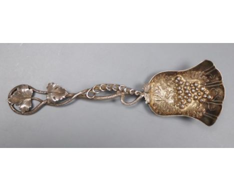 A Victorian silver caddy spoon, with foliate handle, Hilliard &amp; Thomason, Birmingham, 1869, 12.9cm.