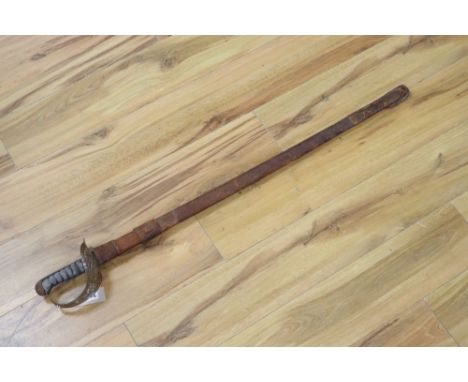 An Edward VII Infantry Officer's sword, shagreen grip and 91cm etched, single edged blade, leather scabbard
