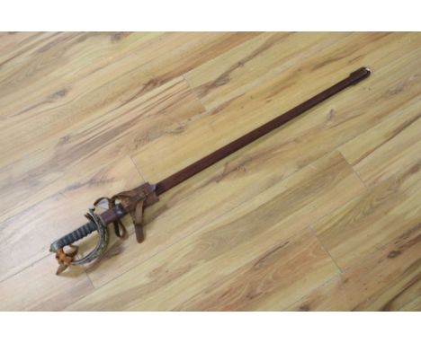 A 1912 Pattern Cavalry sword ER II, shagreen grip and 94cm etched, single edged blade, leather scabbard