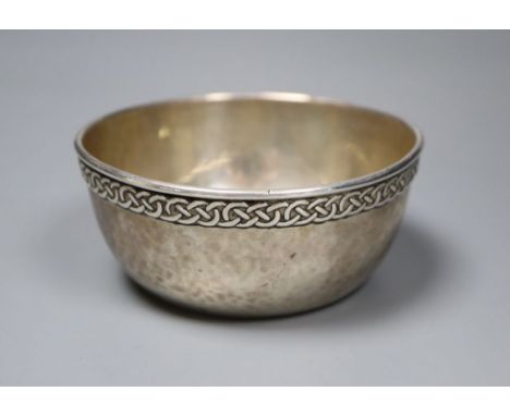 A George V Arts &amp; Crafts Liberty &amp; Co silver bowl with Celtic style border, Birmingham, 1930, diameter 10.5cm, 141 gr
