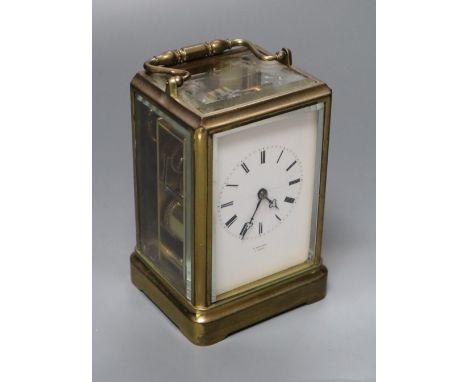 O. Berger, Paris. A carriage clock, with white enamel dial, Japy Freres movement striking on a bell, 19cm incl. handle