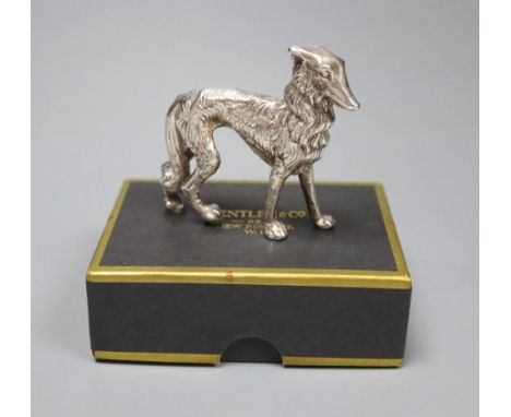 A modern silver model of a dog (filled), height 62mm.