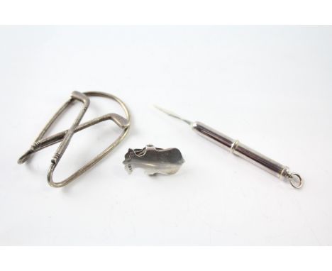 509912 A GROUP OF THREE .925 STERLING SILVER MONEY CLIP, NAPKIN CLIP, TOOTHPICKWeight: 22gms