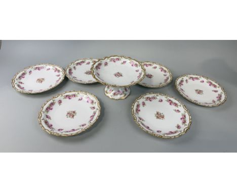 A SET OF SIX LIMOGES PLATES ALONG WITH A CAKESTAND21cm D