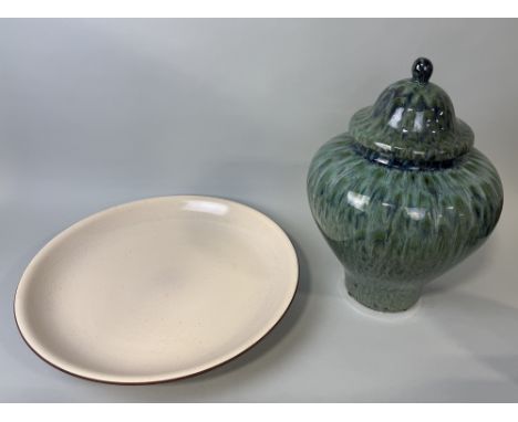 A TURQUOISE MOTTLED CERAMIC TEMPLE JAR AND A IVORY COLOURED CRACKLE GLAZE PLATTERTemple Jar Height: 49cmsPlatter Diamter: 51.