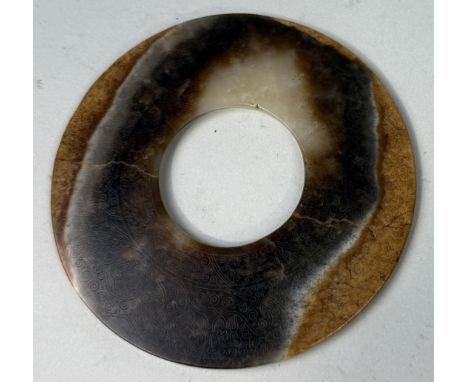A CHINESE JADE / AGATE BI POSSIBLY HAN / ZHOU DYNASTY WITH INCISED DETAIL11cm width 
