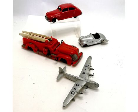 3 x mechanical toys ~ Chad Valley red car, Schuco, Saunders fire engine (34cm long) t/w Dinky Shetland aeroplane - all slight