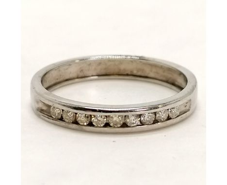 9ct marked white gold half eternity ring channel set with 9 diamonds - size M½ &amp; 2g total weight 