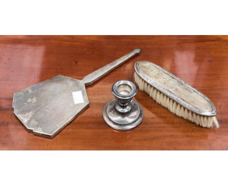 A George V Art Deco silver hand mirror Birmingham 1932, the back with engine turned decoration, together with a silver backed
