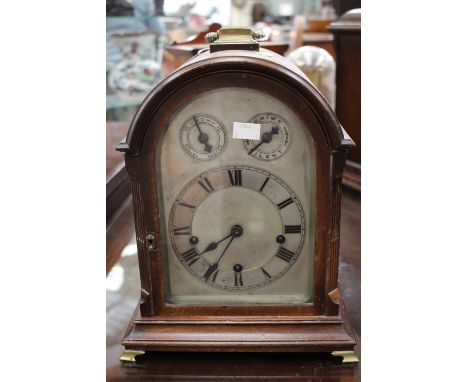 An Edwardian mahogany mantle clock, silver dial Roman numerals 