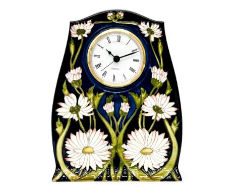 A Moorcroft mantle clock in the 'meadow daisy' pattern, dated 2015, measuring approx 21cm high