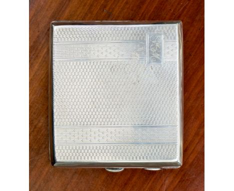 A George V Art Deco silver cigarette case, having engine turned decoration to front and back, initials to cartouche, maker Jo