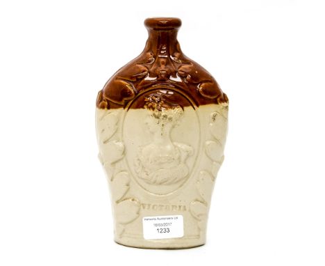 A circa 1830s stoneware gin flask (no stopper), inscribed G to base with a raised pattern of the Queen on one side and the Du