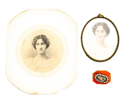 An early 20th century portrait miniature on ivory of lady called Nelly Mellersh wearing a memorial brooch, together with a ph