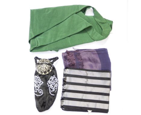 A black and silver mens scarf, a mauve ladies scarf, a green cape, and a late Edwardian black evening purse, with white bead 