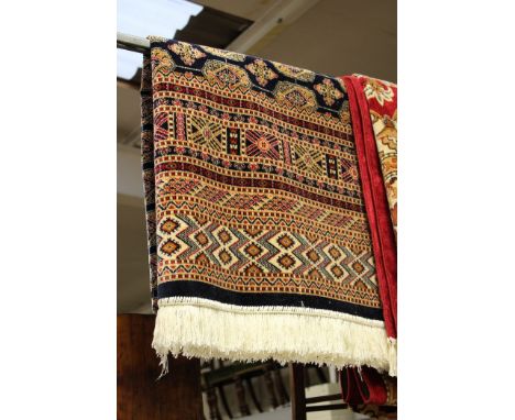 A blue ground Bokhara carpet, 230cm x 160cm