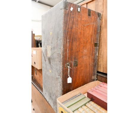 A 19th Century mahogany travelling trunk, brass bound